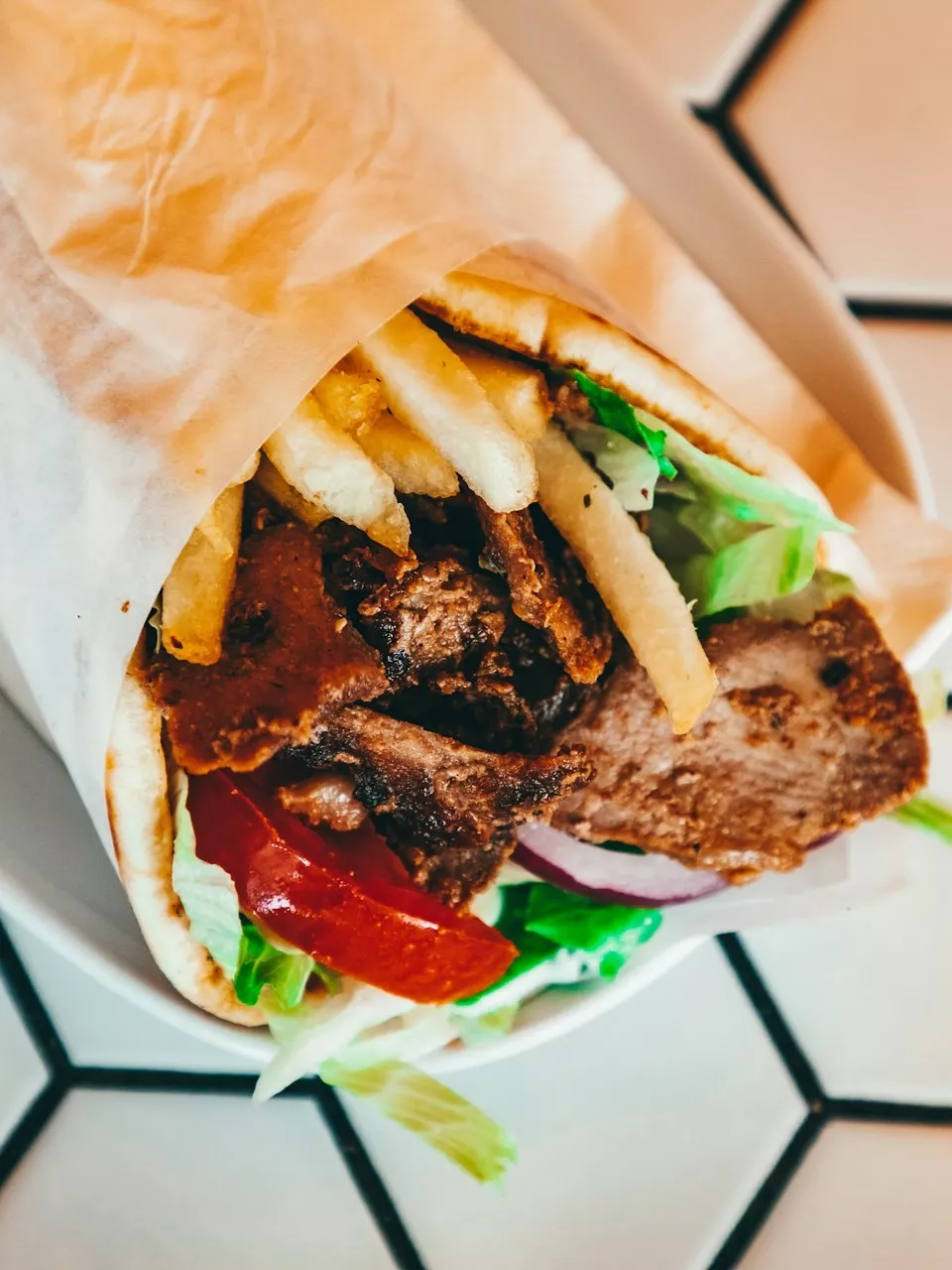 Doner kebab being carved fresh at Tollbar Grill & Pizza in Toll Bar